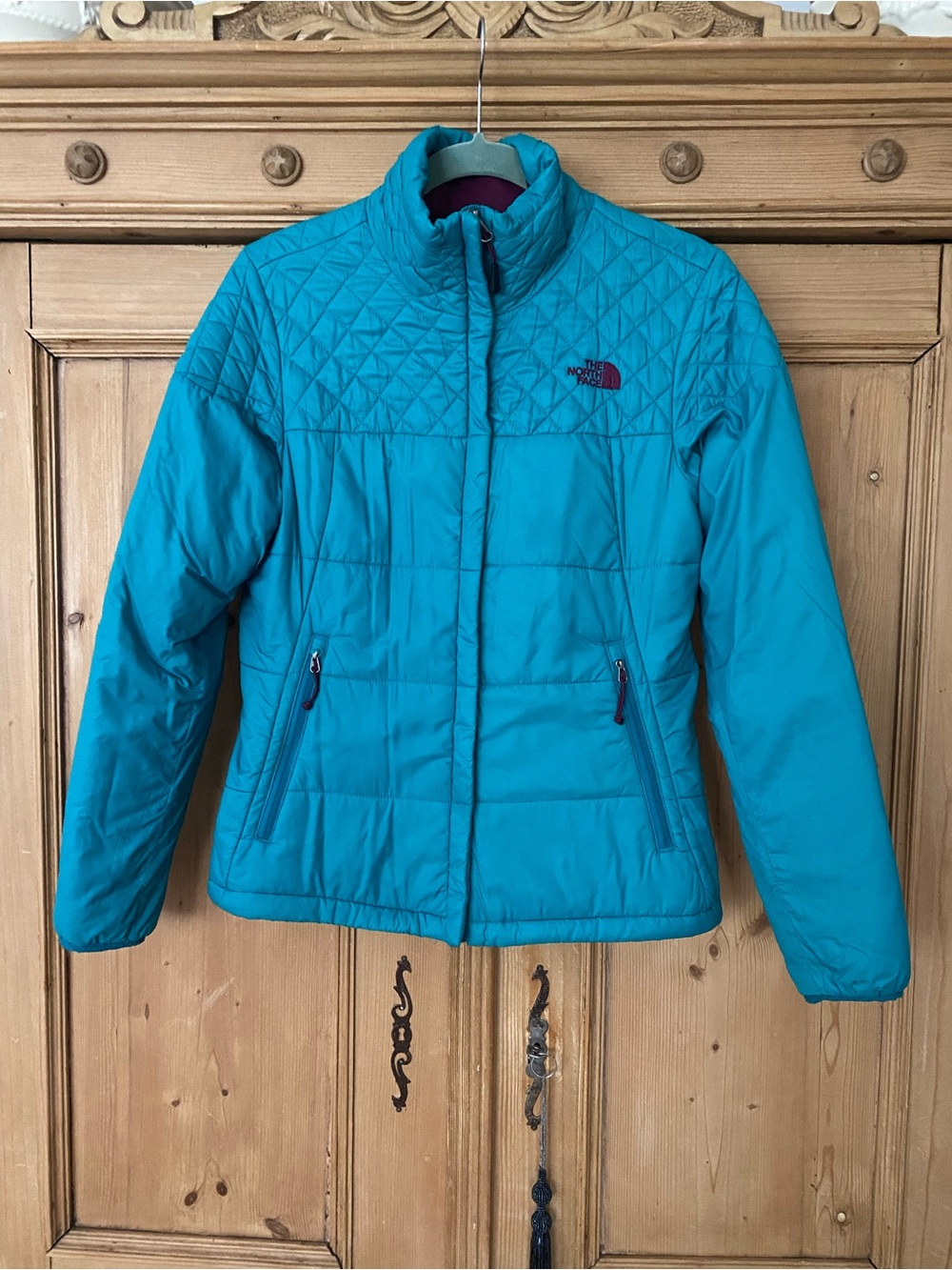 The North Face Teal Quilted Jacket with Magenta Logo
